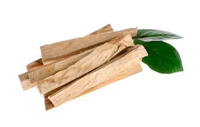 Photo of Palo santo sticks and green leaves on white background