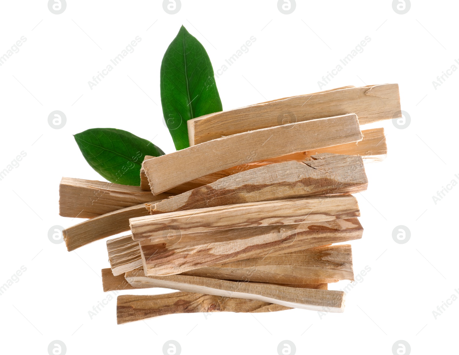 Photo of Palo santo sticks and green leaves on white background