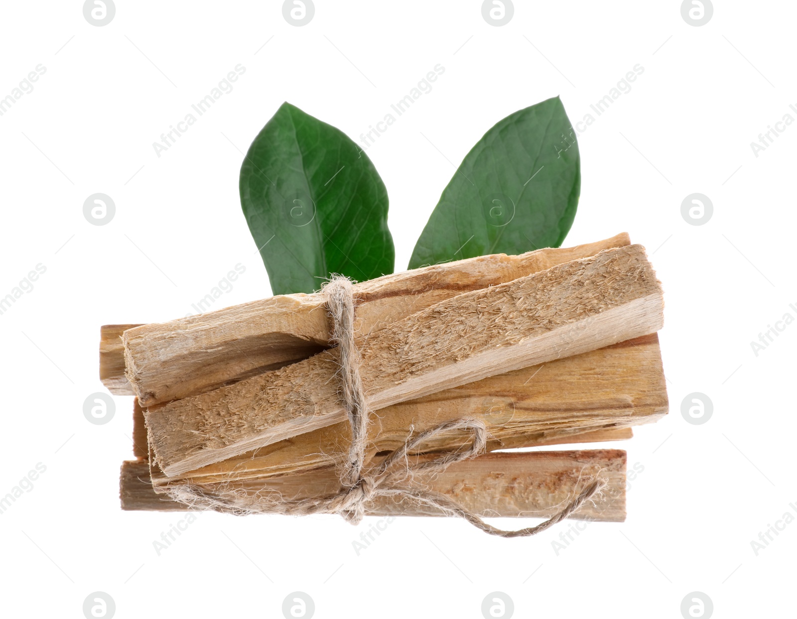 Photo of Palo santo sticks and green leaves on white background