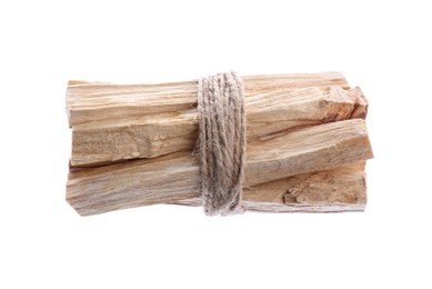 Photo of Bunch of palo santo sticks on white background