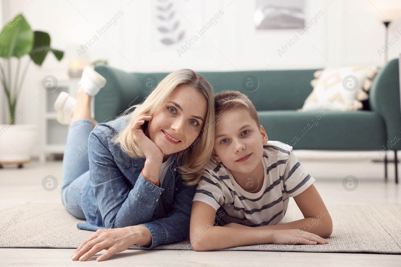 Photo of Mother and son on floor at home