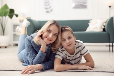 Photo of Mother and son on floor at home