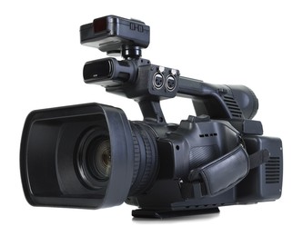 Photo of Modern professional video camera isolated on white