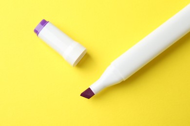 One color marker on yellow background, top view