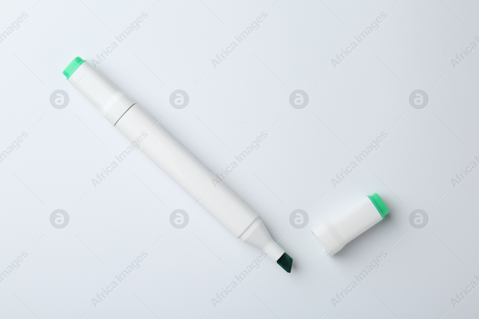 Photo of One color double sided marker on white background, top view