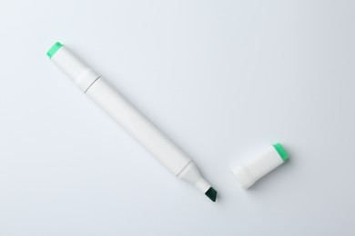 Photo of One color double sided marker on white background, top view