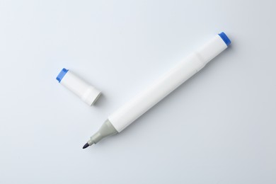 One color double sided marker on white background, top view