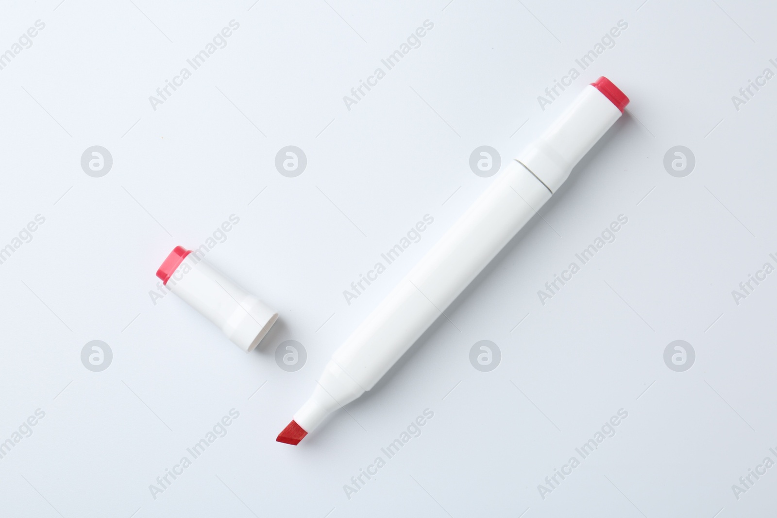 Photo of One color double sided marker on white background, top view