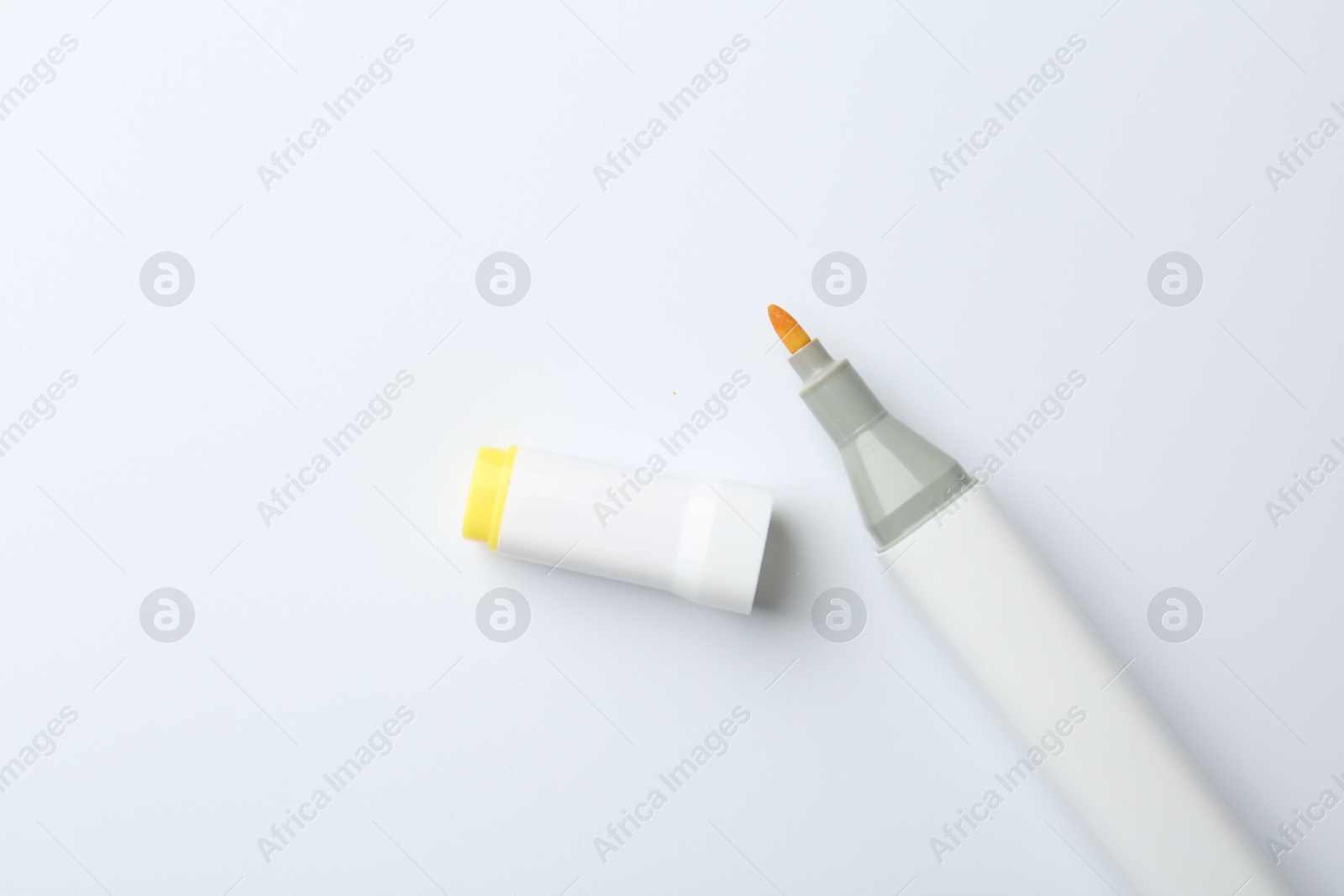 Photo of One color marker on white background, top view. Space for text