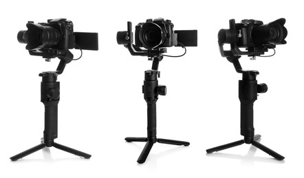 Image of Modern camera with tripod on white background, set. Professional photographer's equipment