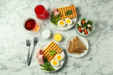 Photo of Flat lay composition with tasty brunch served on white marble table