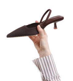 Woman with stylish brown shoe on white background, closeup