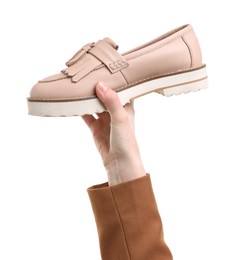 Woman with stylish shoe on white background, closeup