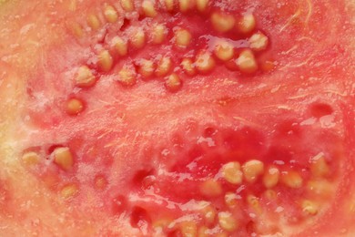 Photo of Juicy guava fruit with seeds as background, top view