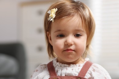 Photo of Portrait of cute little baby girl at home