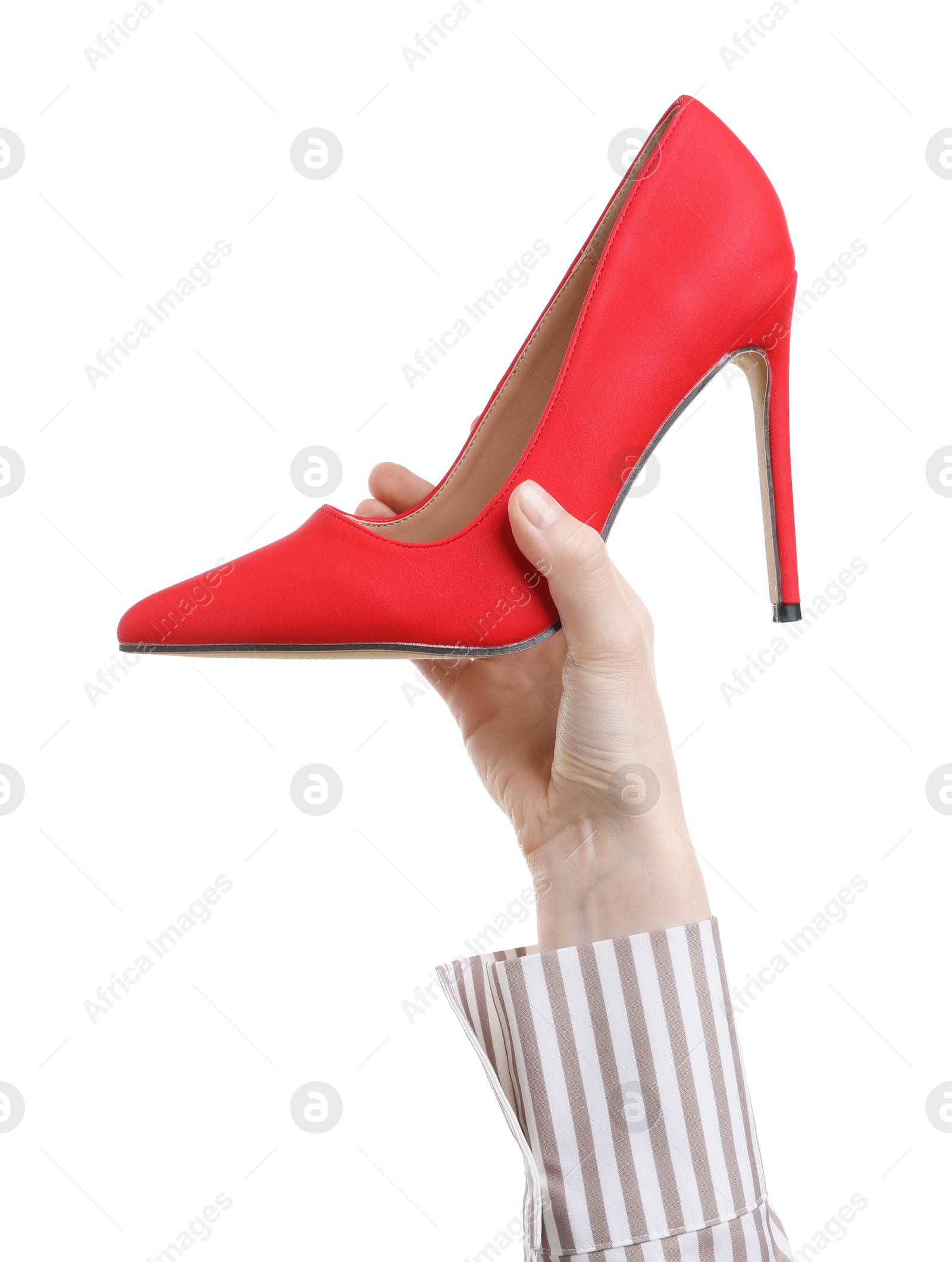 Photo of Woman with high heeled shoe on white background, closeup