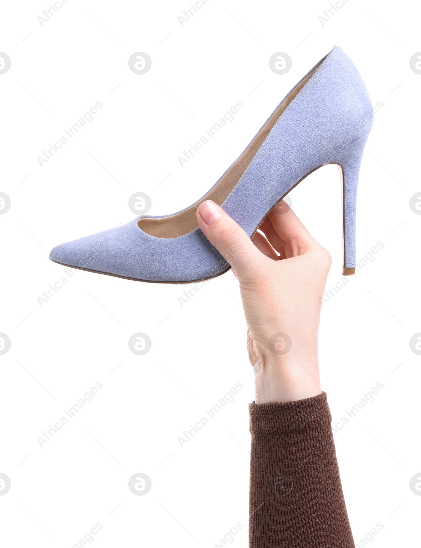 Photo of Woman with high heeled shoe on white background, closeup