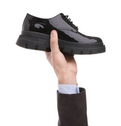 Photo of Man with stylish shoe on white background, closeup