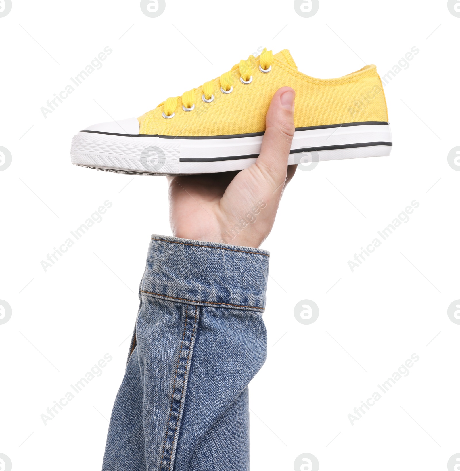 Photo of Man with stylish sneaker on white background, closeup