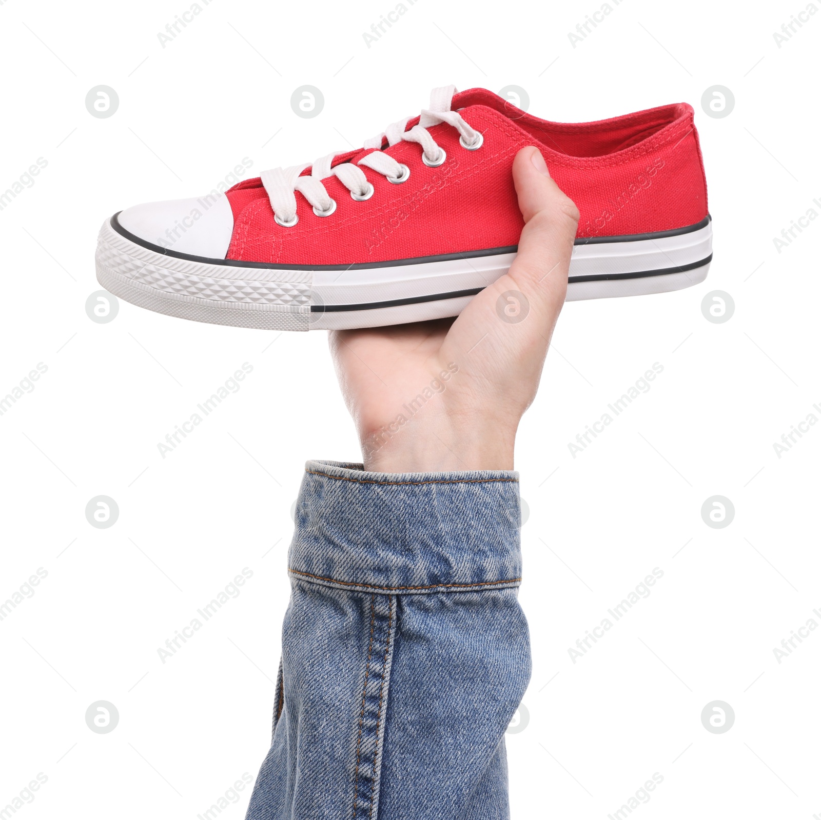 Photo of Man with stylish sneaker on white background, closeup