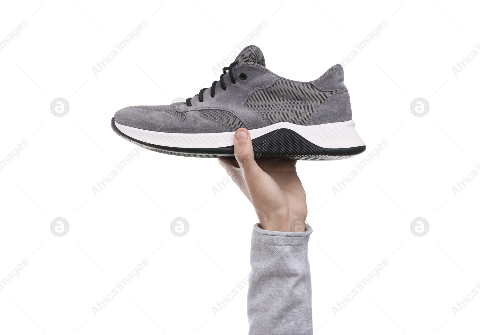 Photo of Man with stylish sneaker on white background, closeup