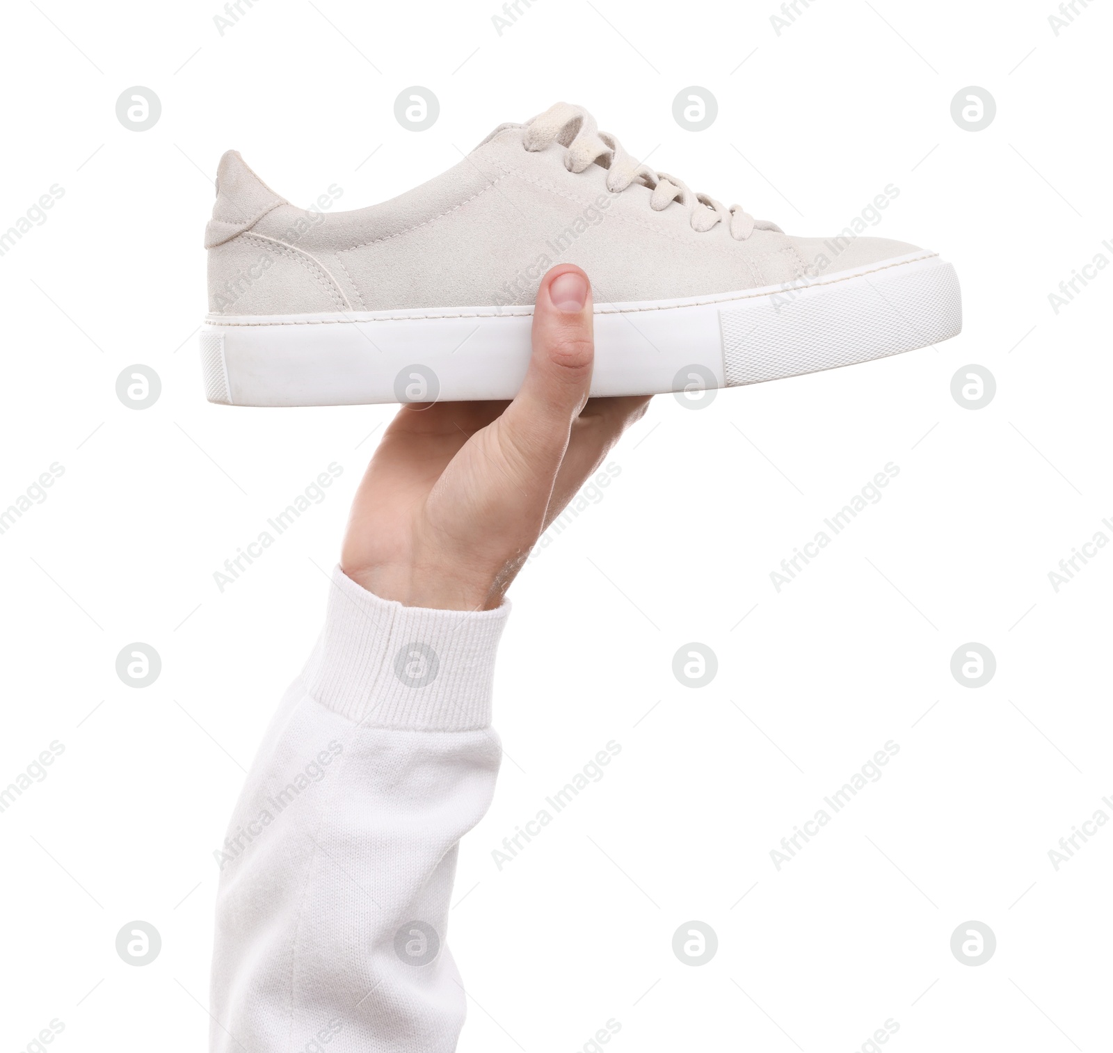 Photo of Man with stylish sneaker on white backpack, closeup