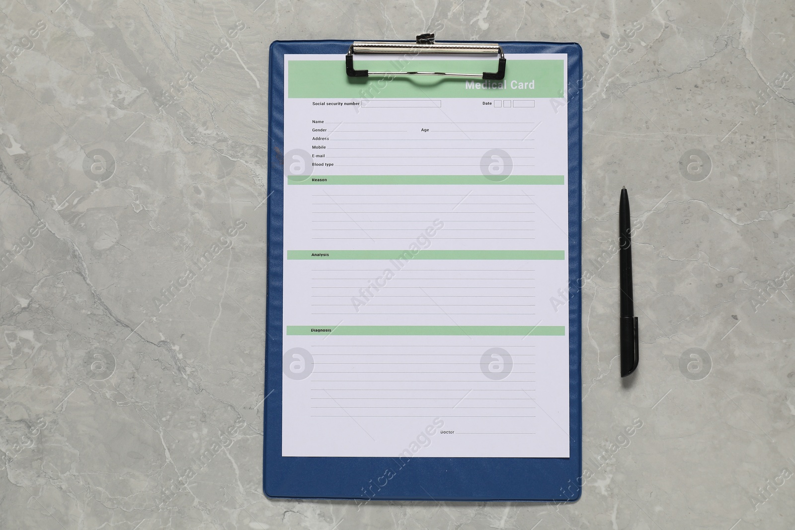 Photo of Medical card form and pen on grey background, top view