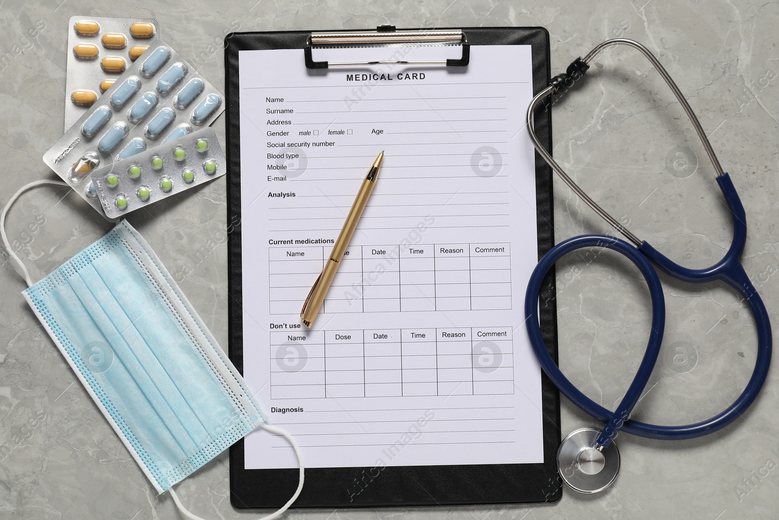 Photo of Flat lay composition with medical card form on grey background