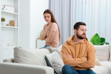 Resentful couple in living room. Relationship problem