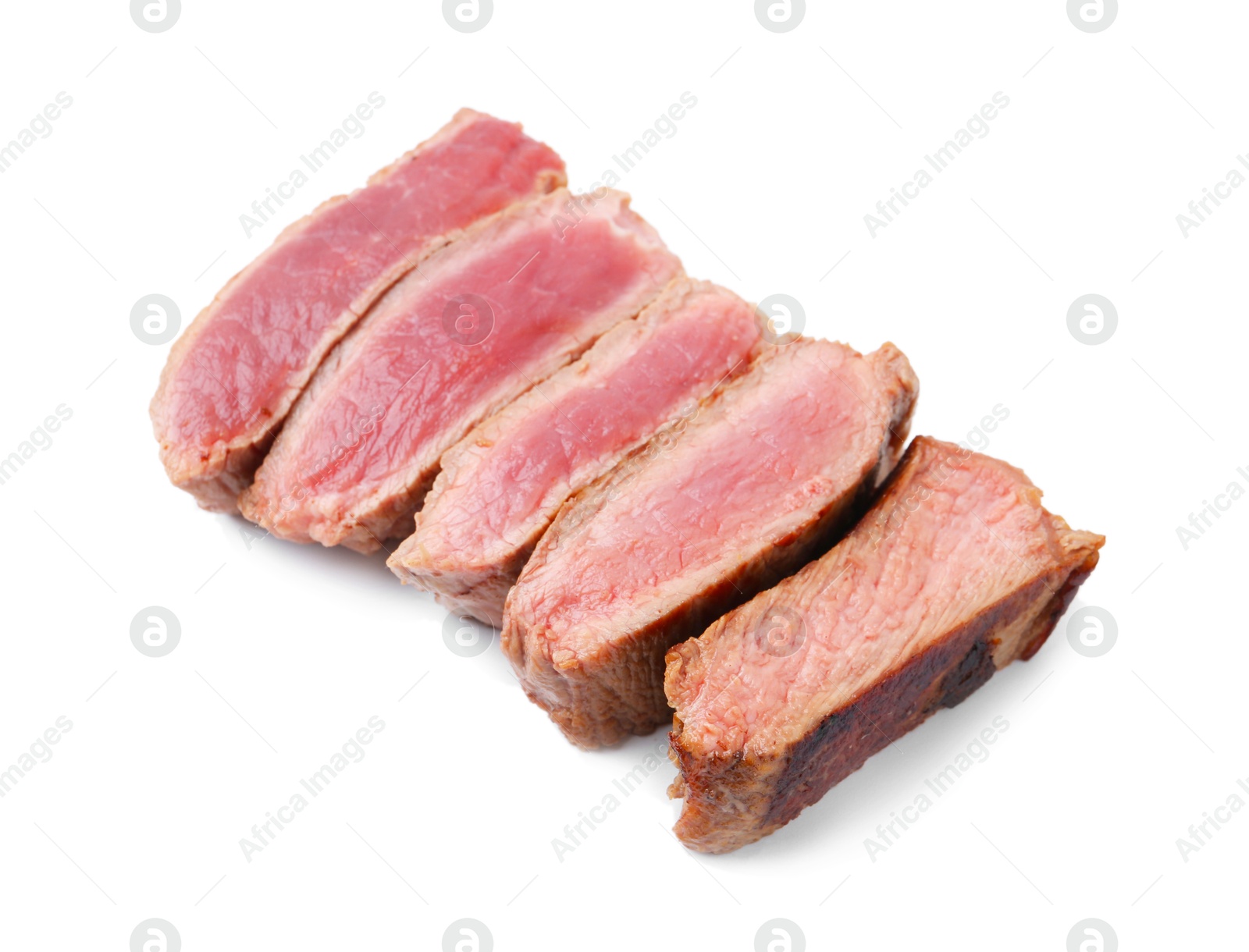 Photo of Delicious sliced beef tenderloin with different degrees of doneness isolated on white