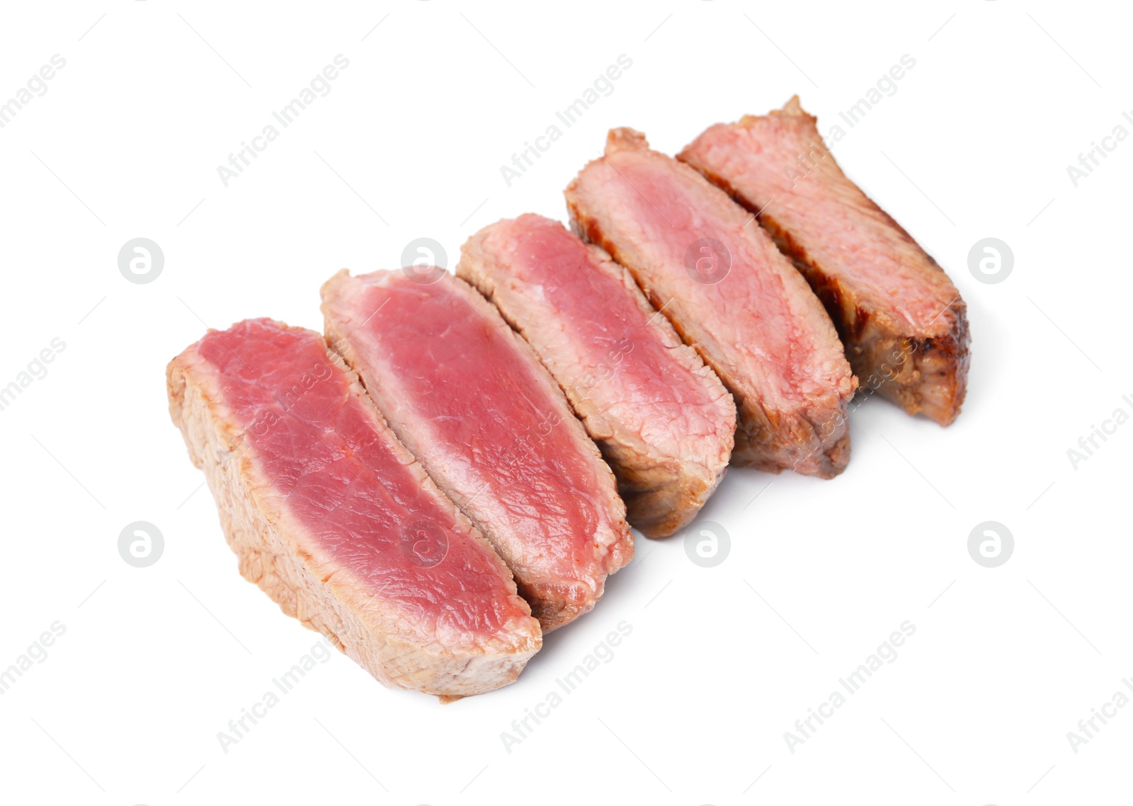 Photo of Delicious sliced beef tenderloin with different degrees of doneness isolated on white