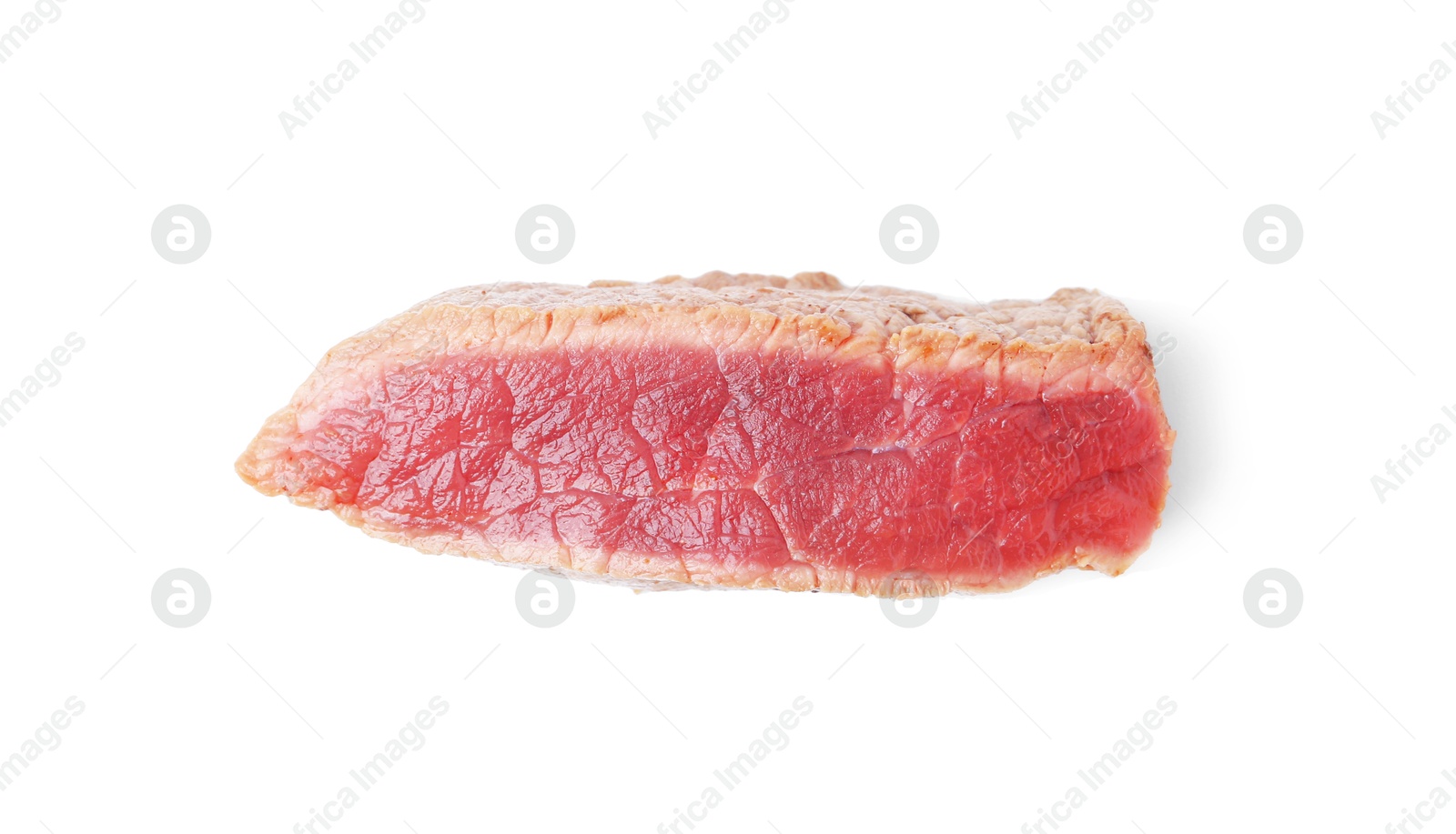 Photo of Slice of beef tenderloin cooked to rare isolated on white, top view