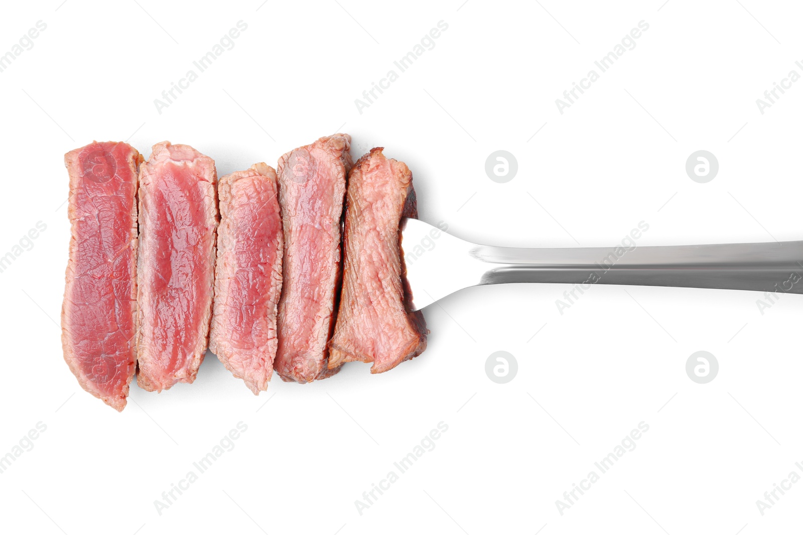 Photo of Delicious sliced beef tenderloin with different degrees of doneness isolated on white, top view