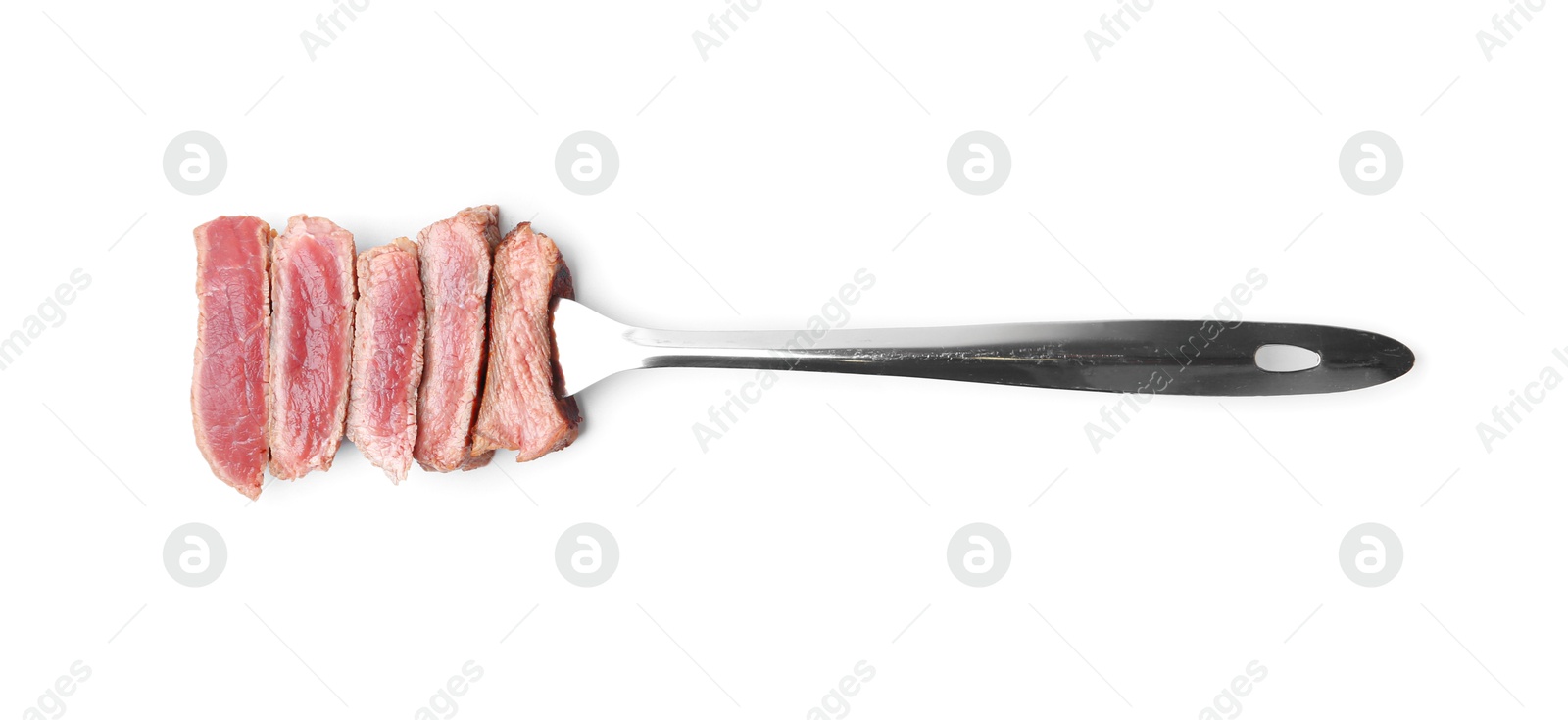 Photo of Delicious sliced beef tenderloin with different degrees of doneness isolated on white, top view