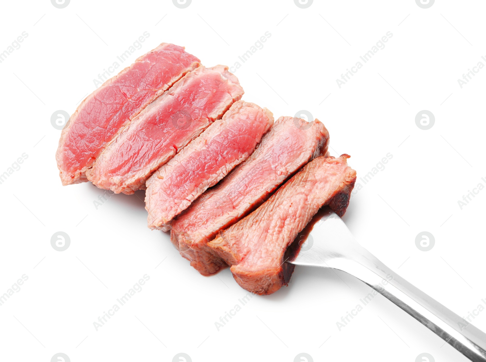 Photo of Delicious sliced beef tenderloin with different degrees of doneness isolated on white