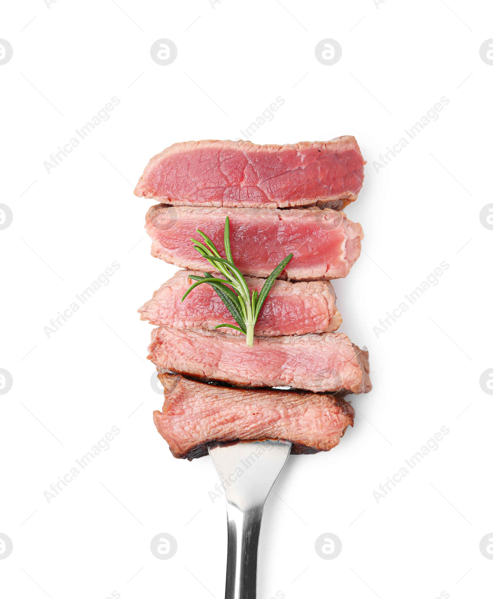 Photo of Delicious sliced beef tenderloin with different degrees of doneness and rosemary isolated on white, top view