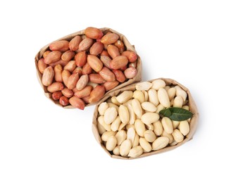 Photo of Fresh peanuts in paper bags isolated on white, top view
