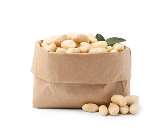 Photo of Peeled peanuts in paper bag isolated on white