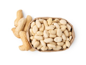 Photo of Peeled peanuts in paper bag and unpeeled ones isolated on white, top view