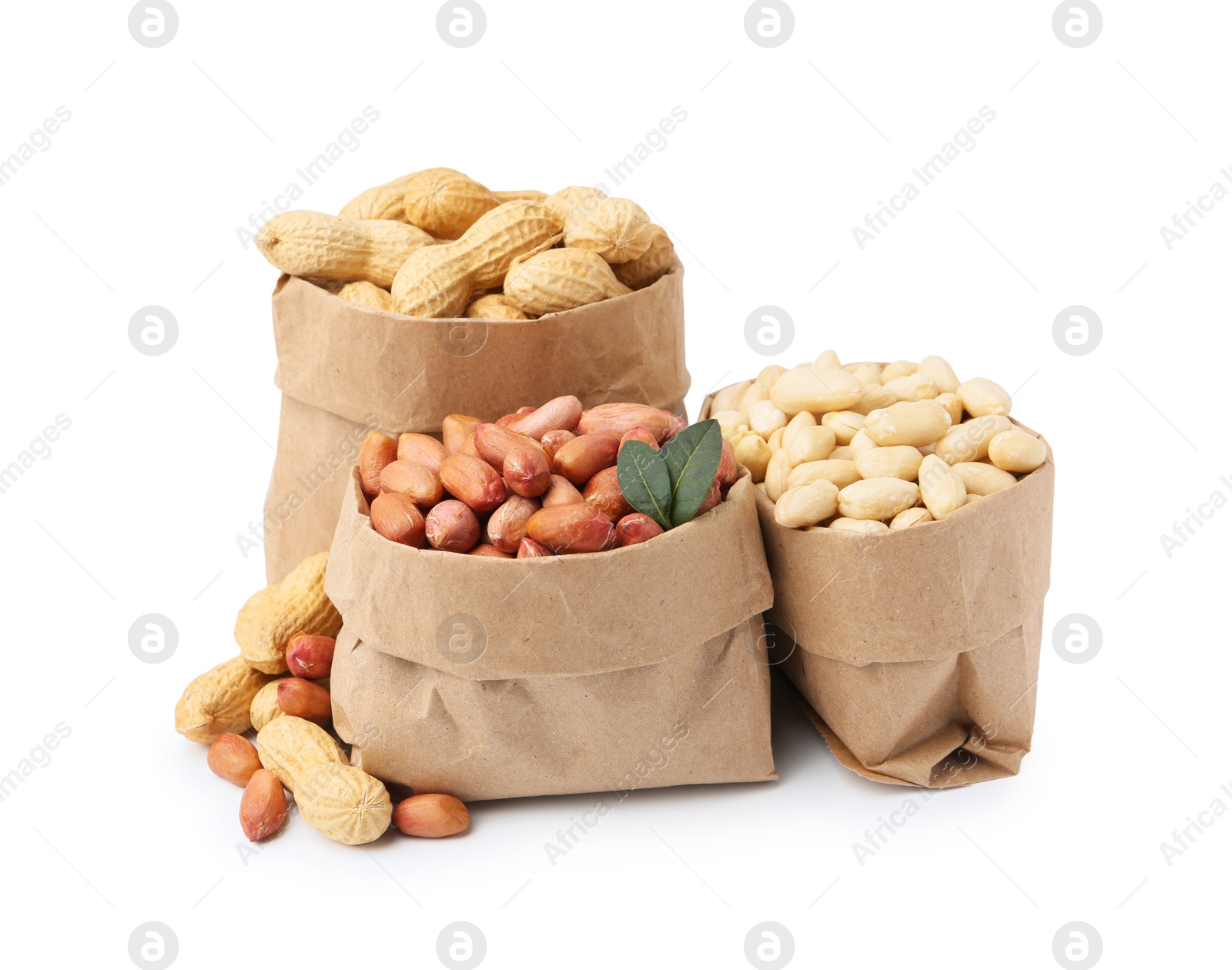 Photo of Different peanuts in paper bags isolated on white