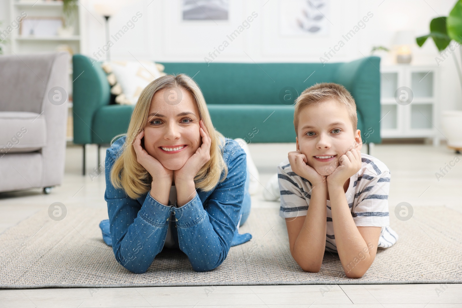 Photo of Mother and son on floor at home