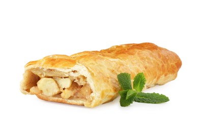 Photo of Delicious strudel with apples, powdered sugar and mint isolated on white