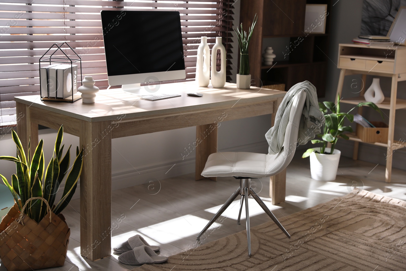 Photo of Comfortable workplace with computer in home office