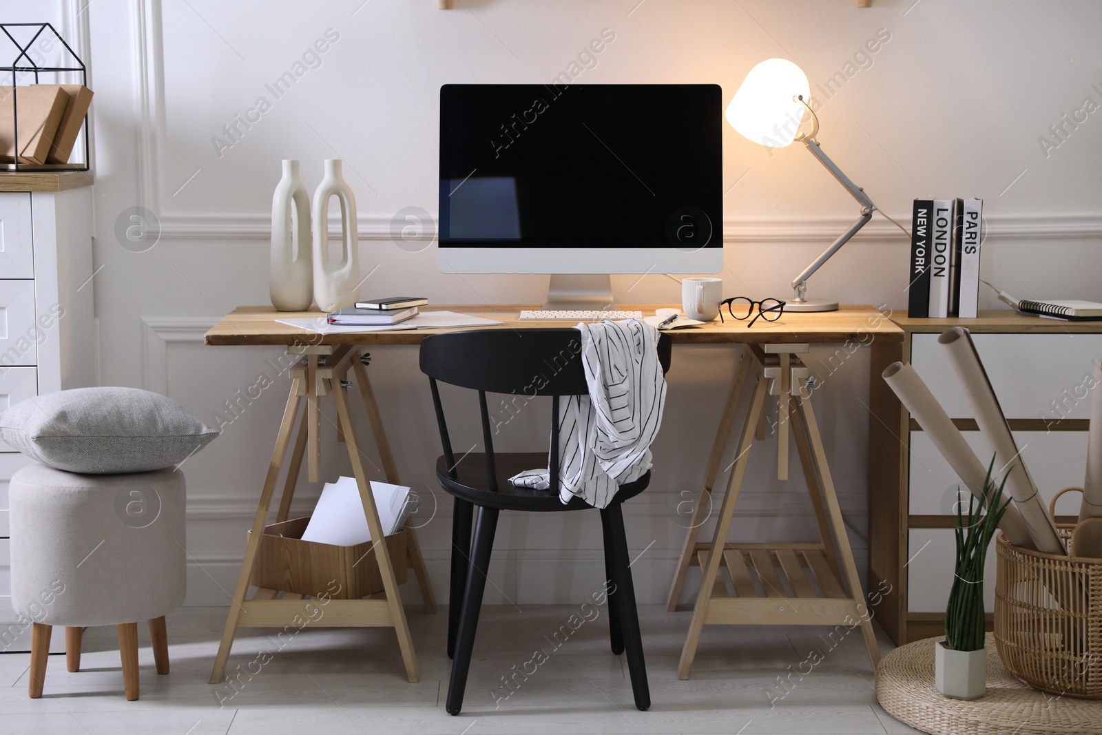 Photo of Comfortable workplace with computer in home office