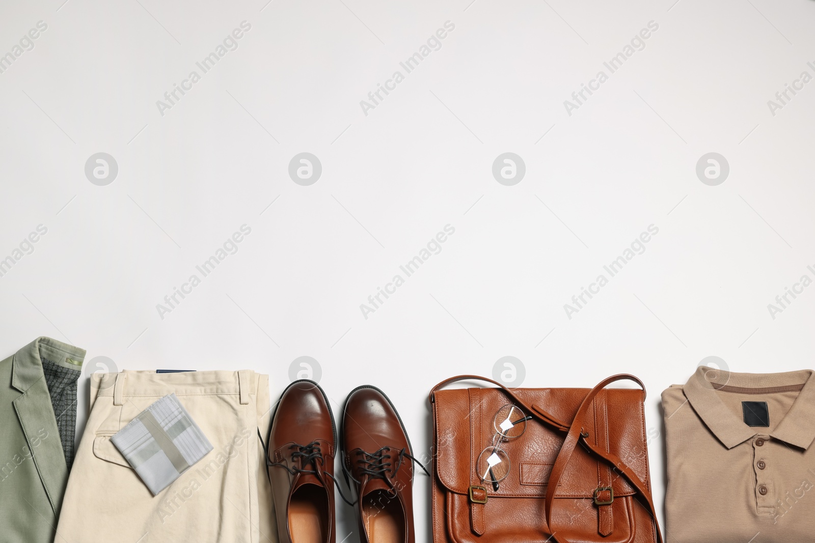 Photo of Elegant men's outfit. Stylish clothes, accessories and shoes on white background, flat lay. Space for text