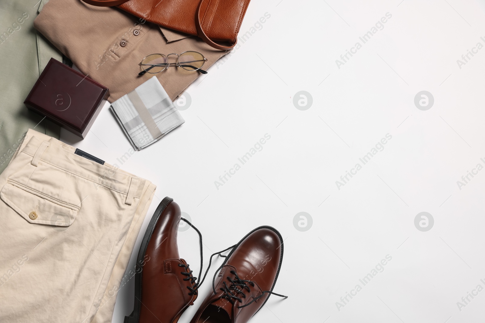 Photo of Elegant men's outfit. Stylish clothes, accessories and shoes on white background, flat lay. Space for text