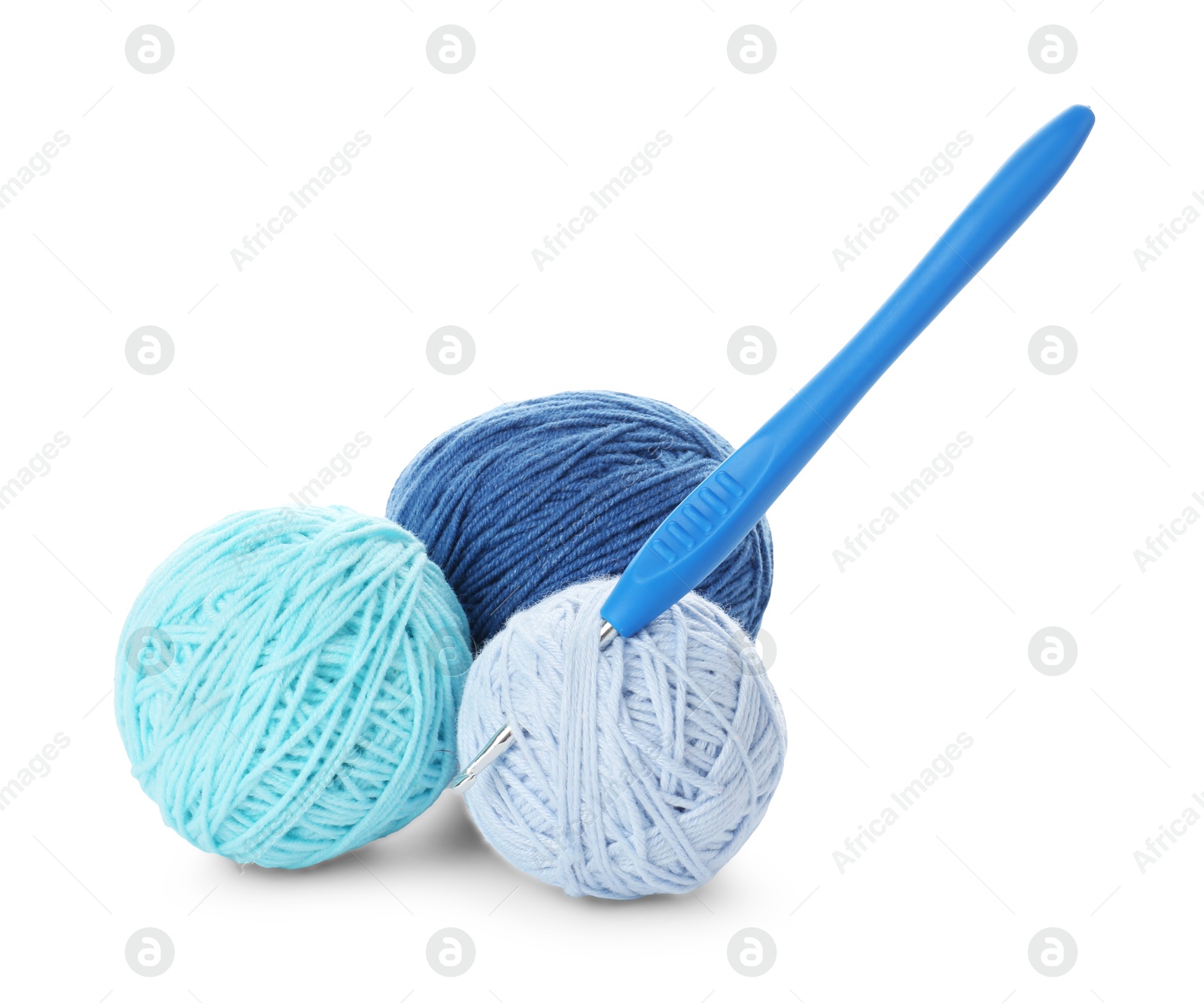 Photo of Balls of colorful yarns and crochet hook isolated on white