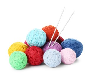 Balls of colorful yarns and knitting needles isolated on white