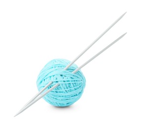 Ball of light blue yarn and knitting needles isolated on white