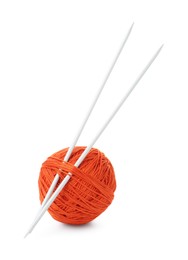 Photo of Ball of orange yarn and knitting needles isolated on white